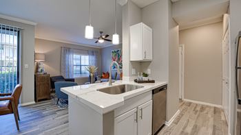 Open kitchen with island and pendant lighting